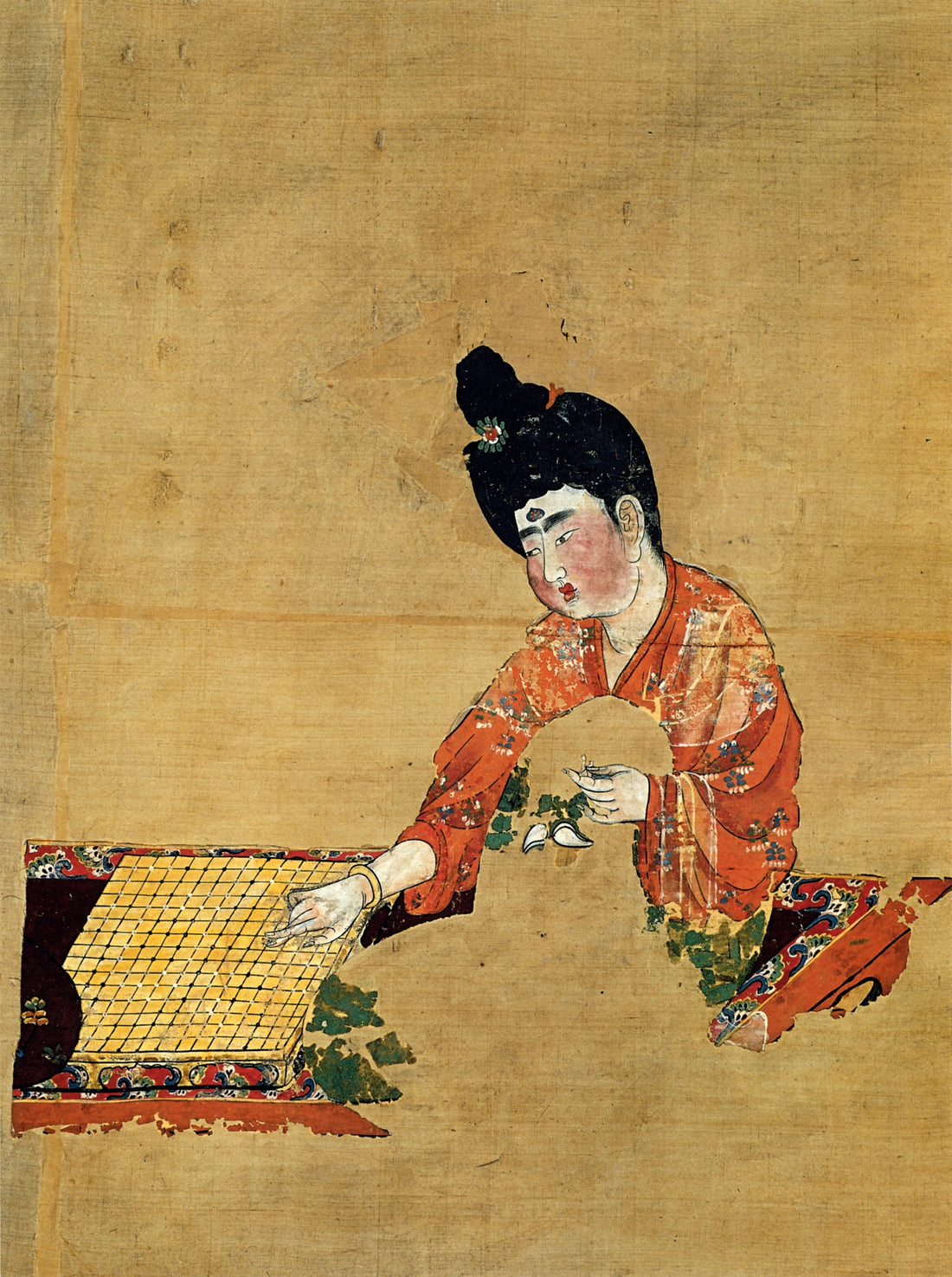 Tang dynasty painting of a woman playing Go (weiqi), from the Astana Tombs, Xinjiang, c. 744 CE.