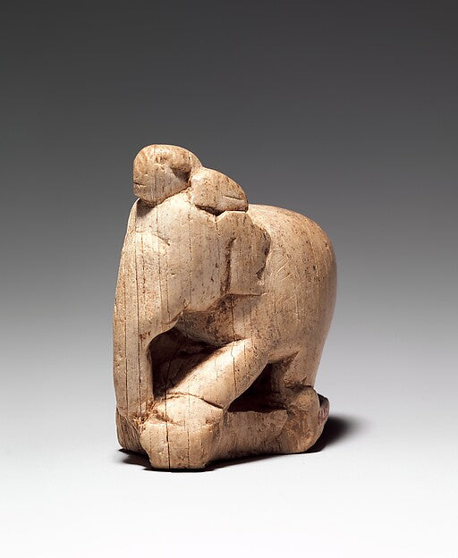 An early abstract ivory chess piece, 7th-8th century, of the kind that carried the Indian game of chaturanga westward into the Islamic world. The Metropolitan Museum of Art, Open Access.