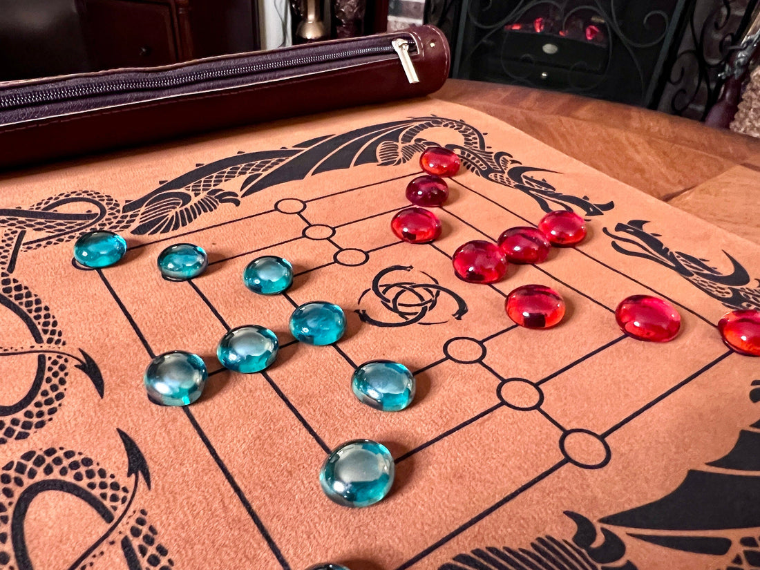 A handcrafted Nine Men's Morris game printed on a portable roll-up mat, ready to pack for travel.