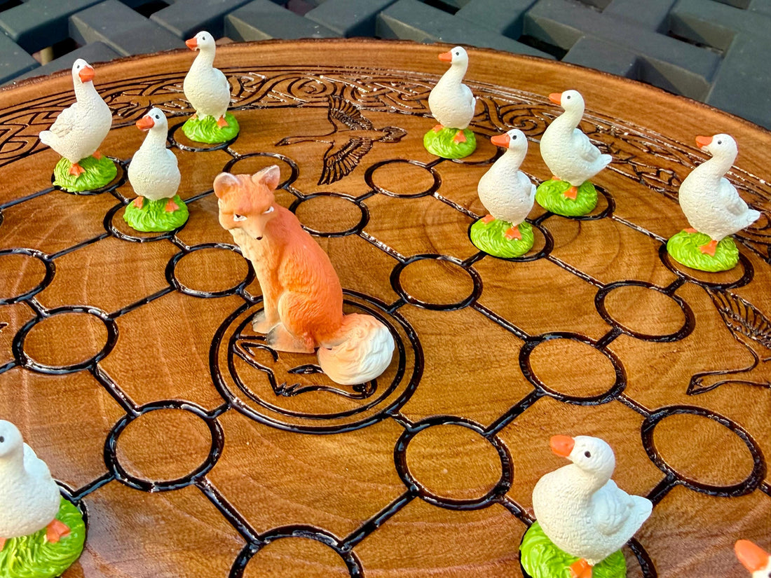 Handcrafted wooden Fox and Geese board game with playing pieces